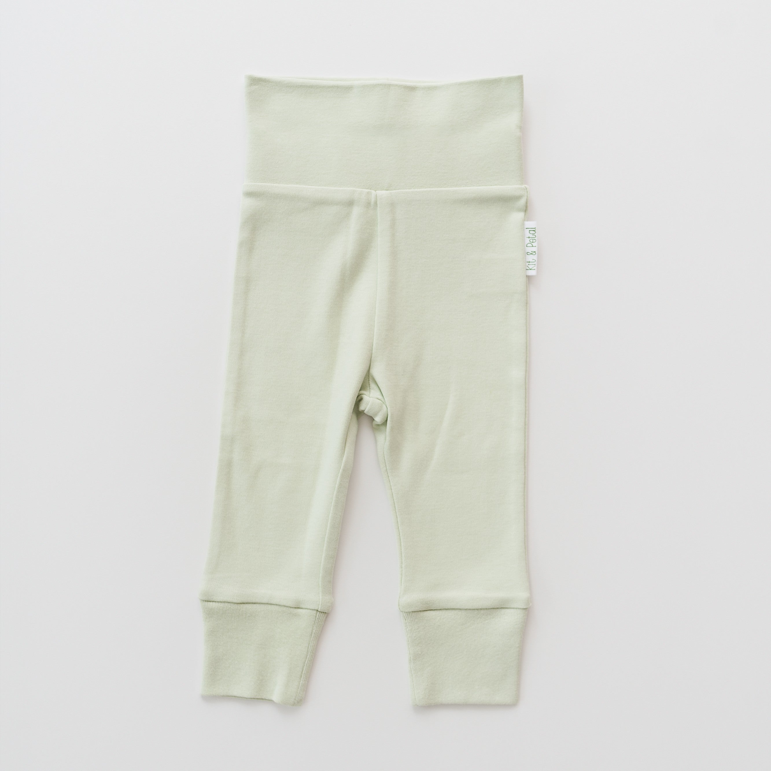 Organic cotton baby fold-over pants in leafy green