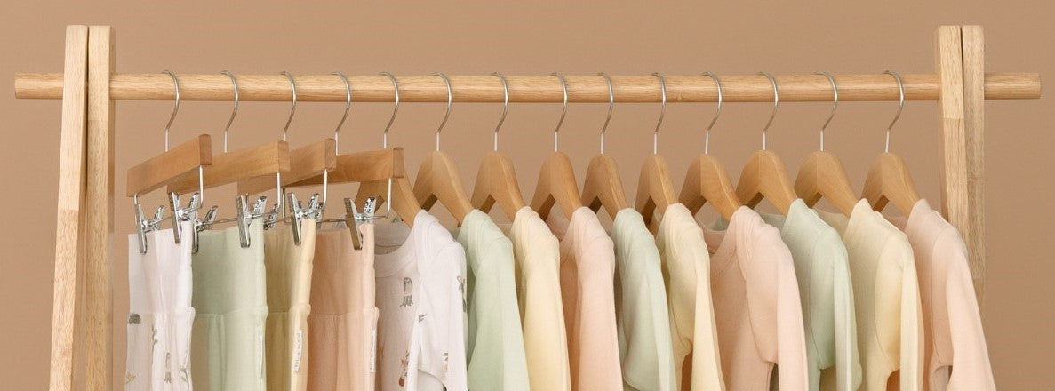 Collection of Kit & Petal pieces hanging up on a clothing rack