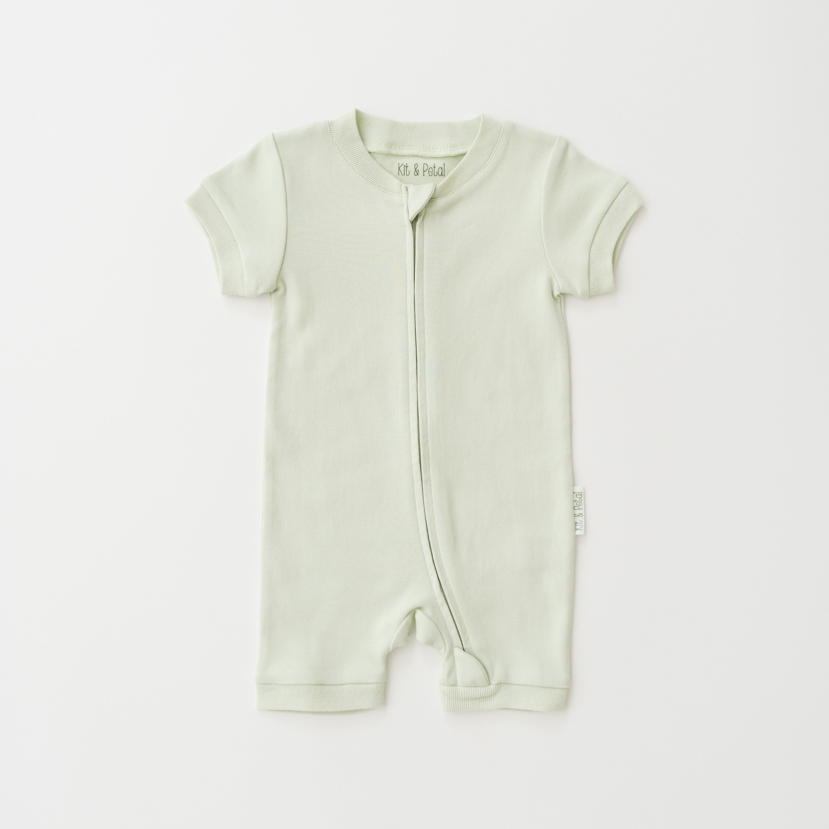 Organic cotton baby romper in leafy green, short sleeve design