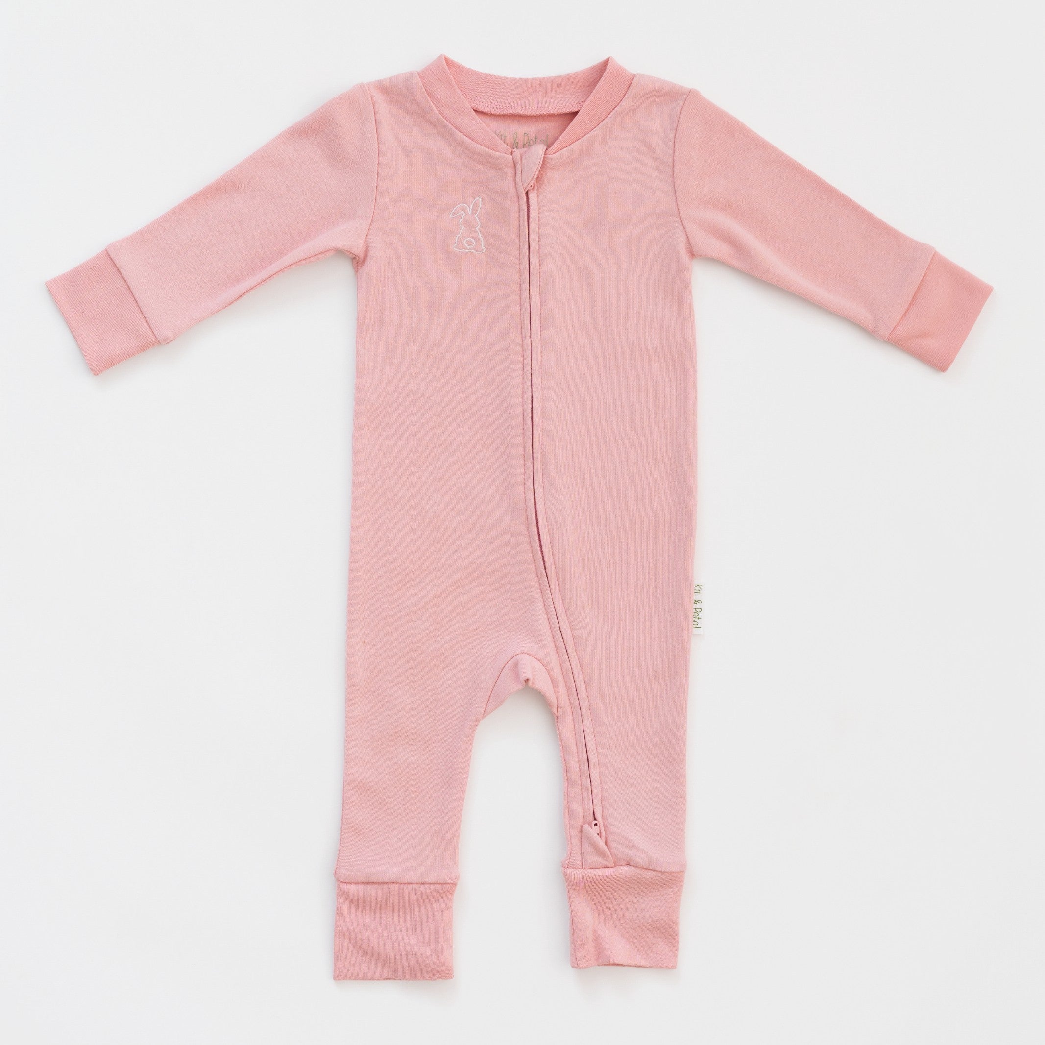 Long sleeve romper in pink with white bunny outline embroidery on the chest