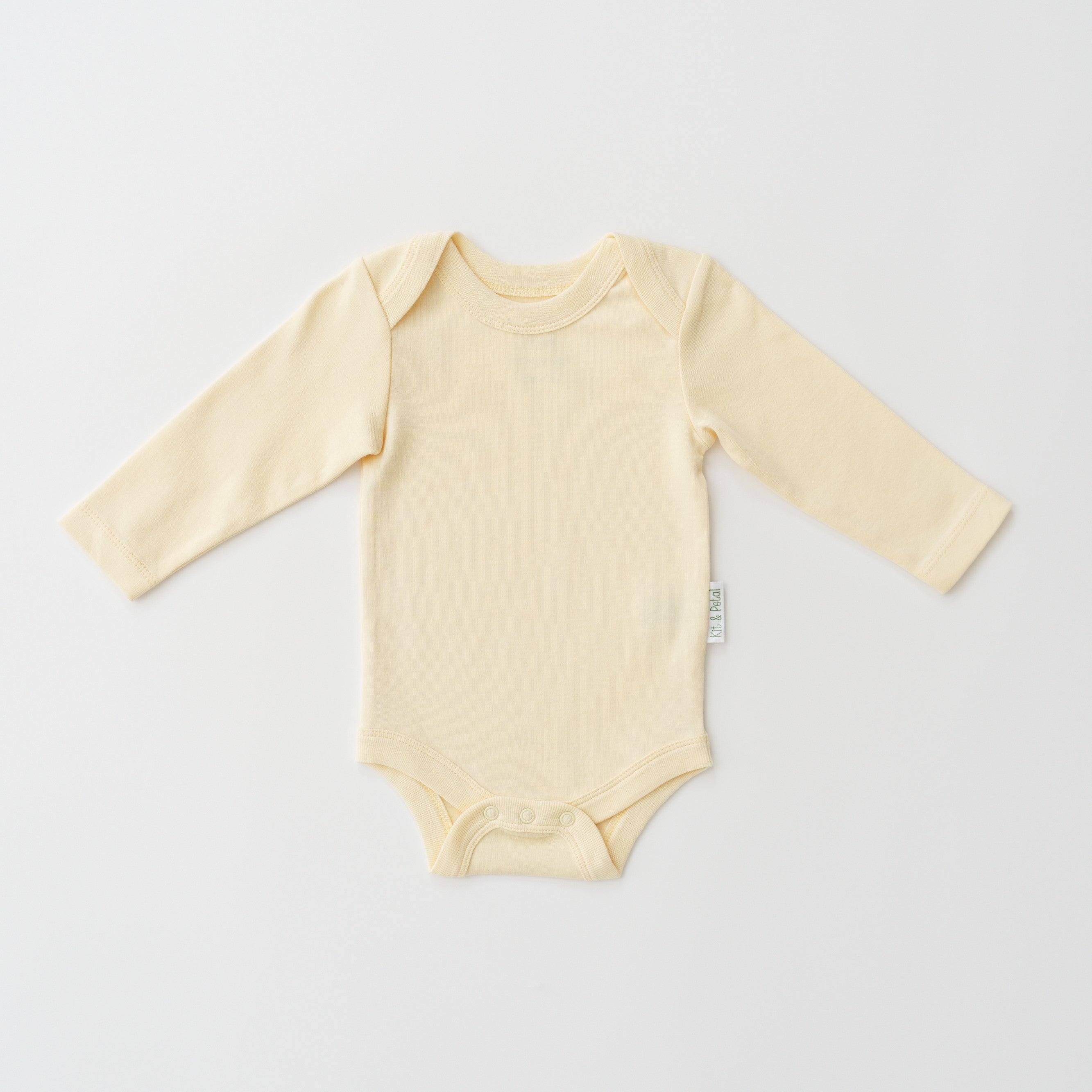Organic cotton baby long sleeve bodysuit in sunny yellow