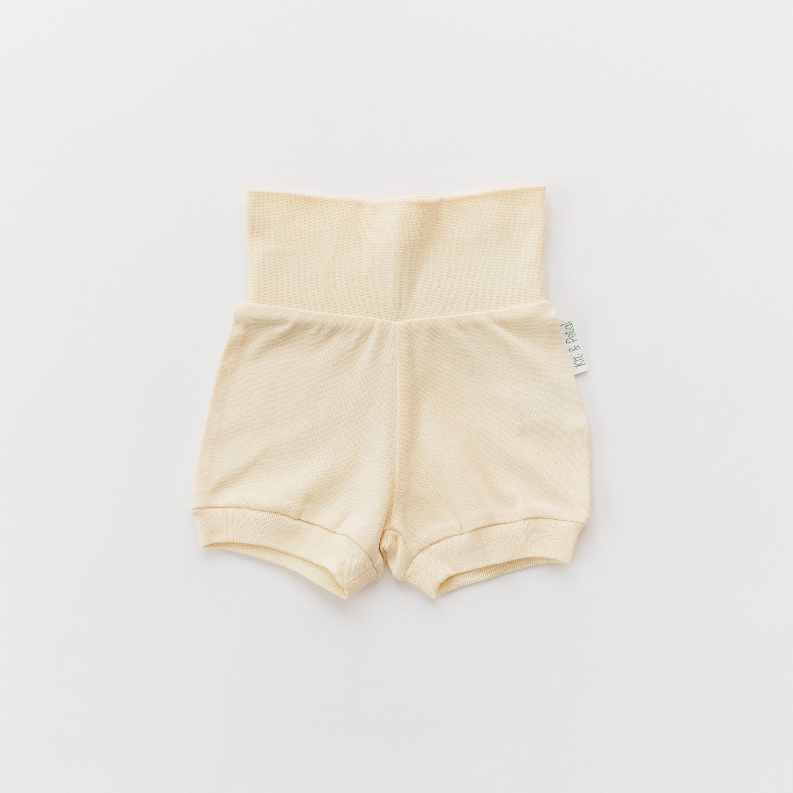 Organic cotton baby fold-over shorts in sunny yellow