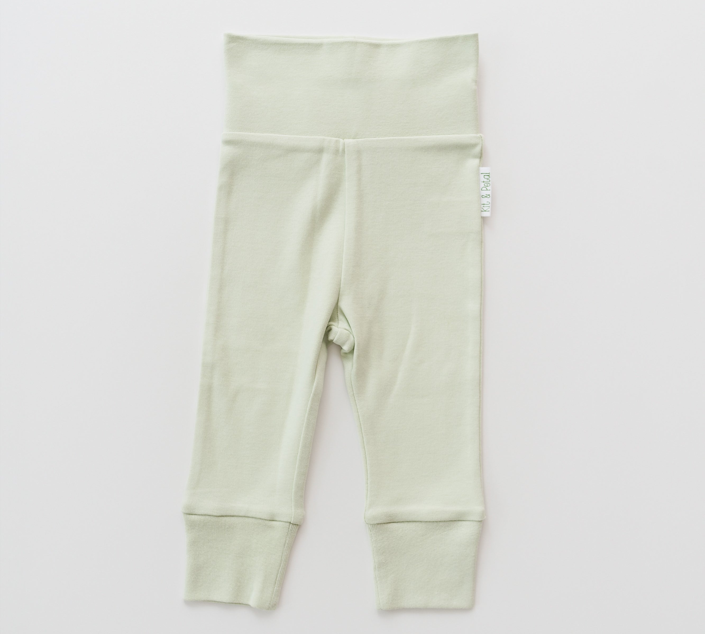 Organic cotton baby fold-over pants in leafy green