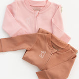 Long sleeve rompers in pink and brown with bunny embroidery on the chest