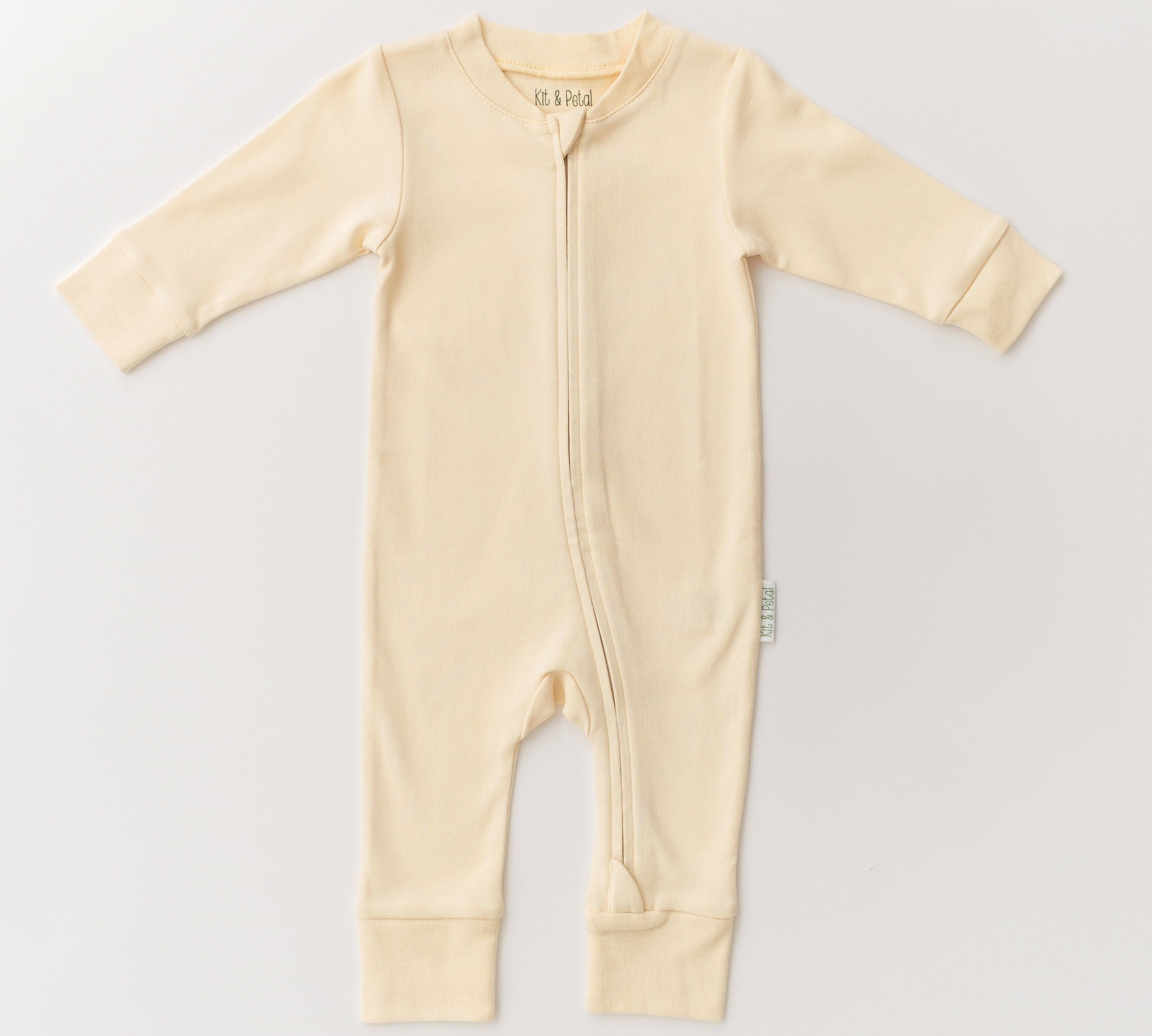 Organic cotton baby long sleeve romper in sunny yellow