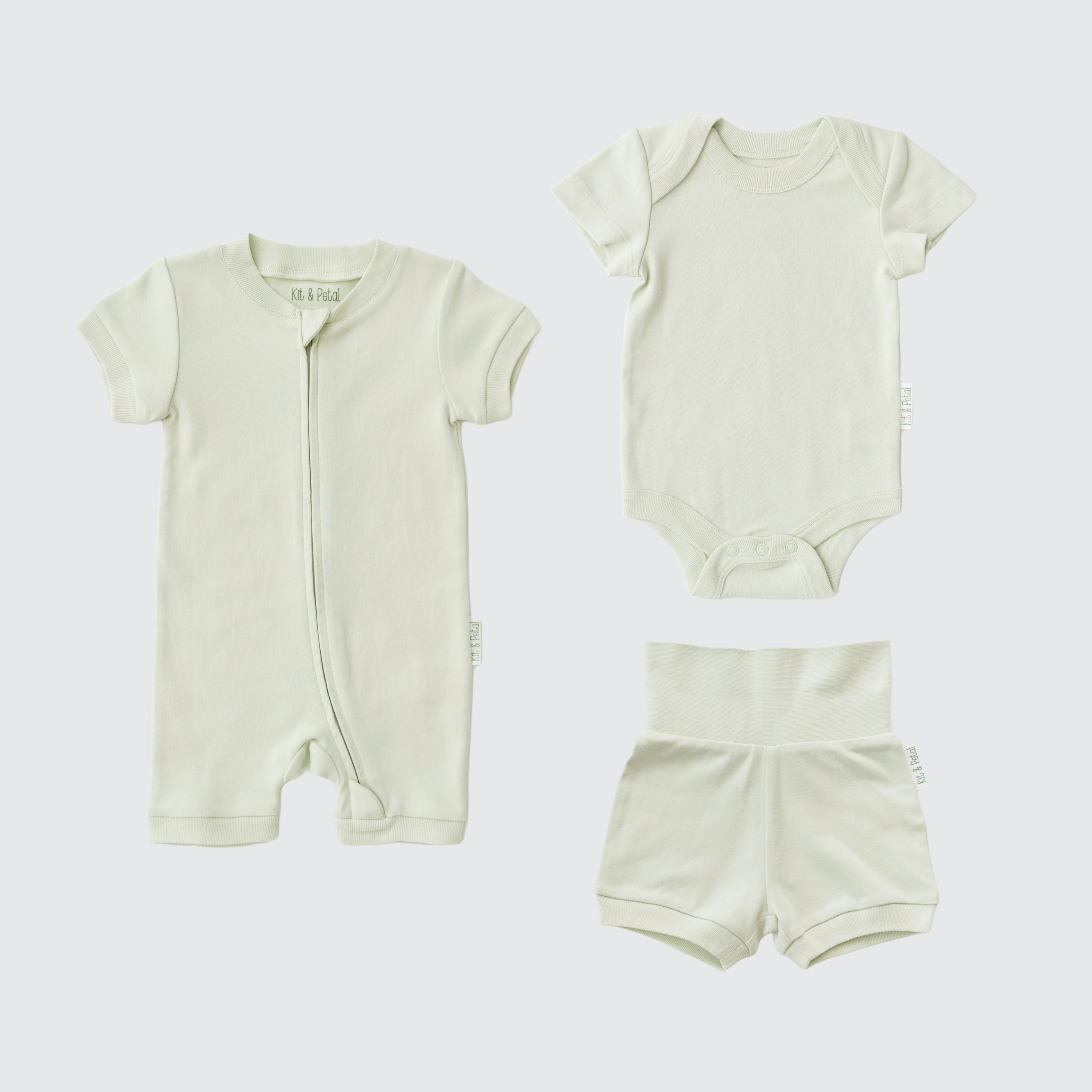 Leafy Green organic cotton baby outfit set with short sleeve romper, short sleeve bodysuit, and fold-over shorts.