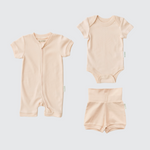 Rosy Peach organic cotton baby outfit set with short sleeve romper, short sleeve bodysuit, and fold-over shorts.