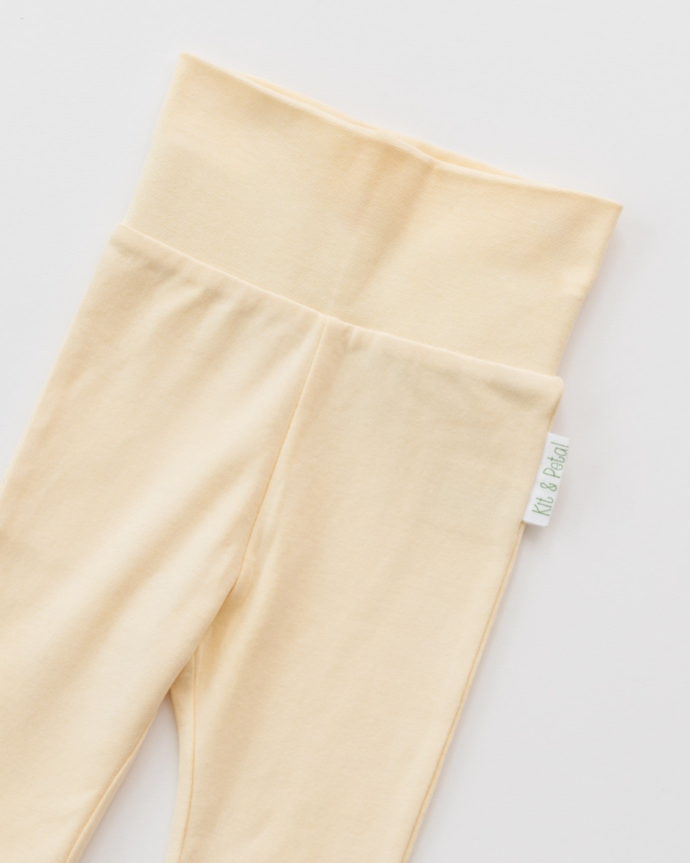 Yellow Kit & petal pants on a white background